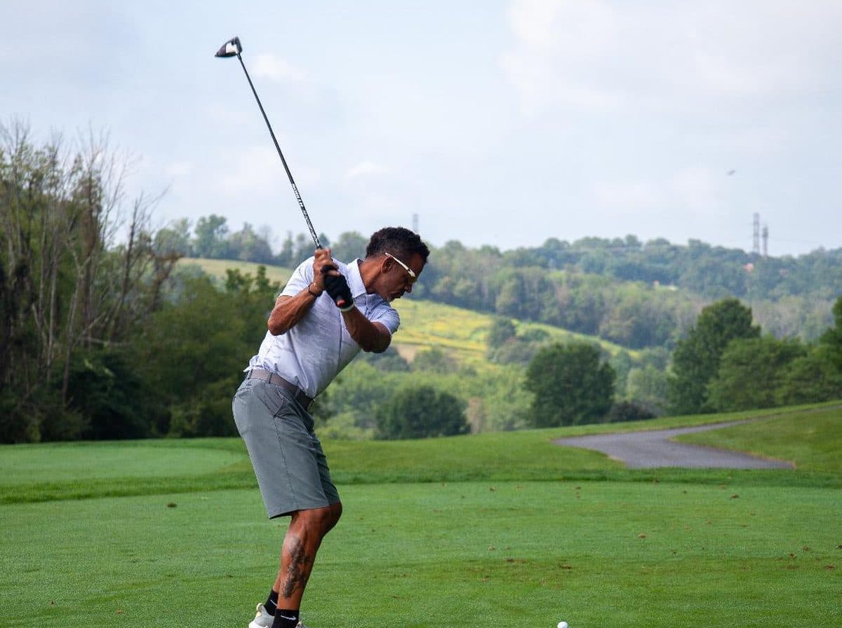 Andre Reed driving the ball at his Charity Golf Classic