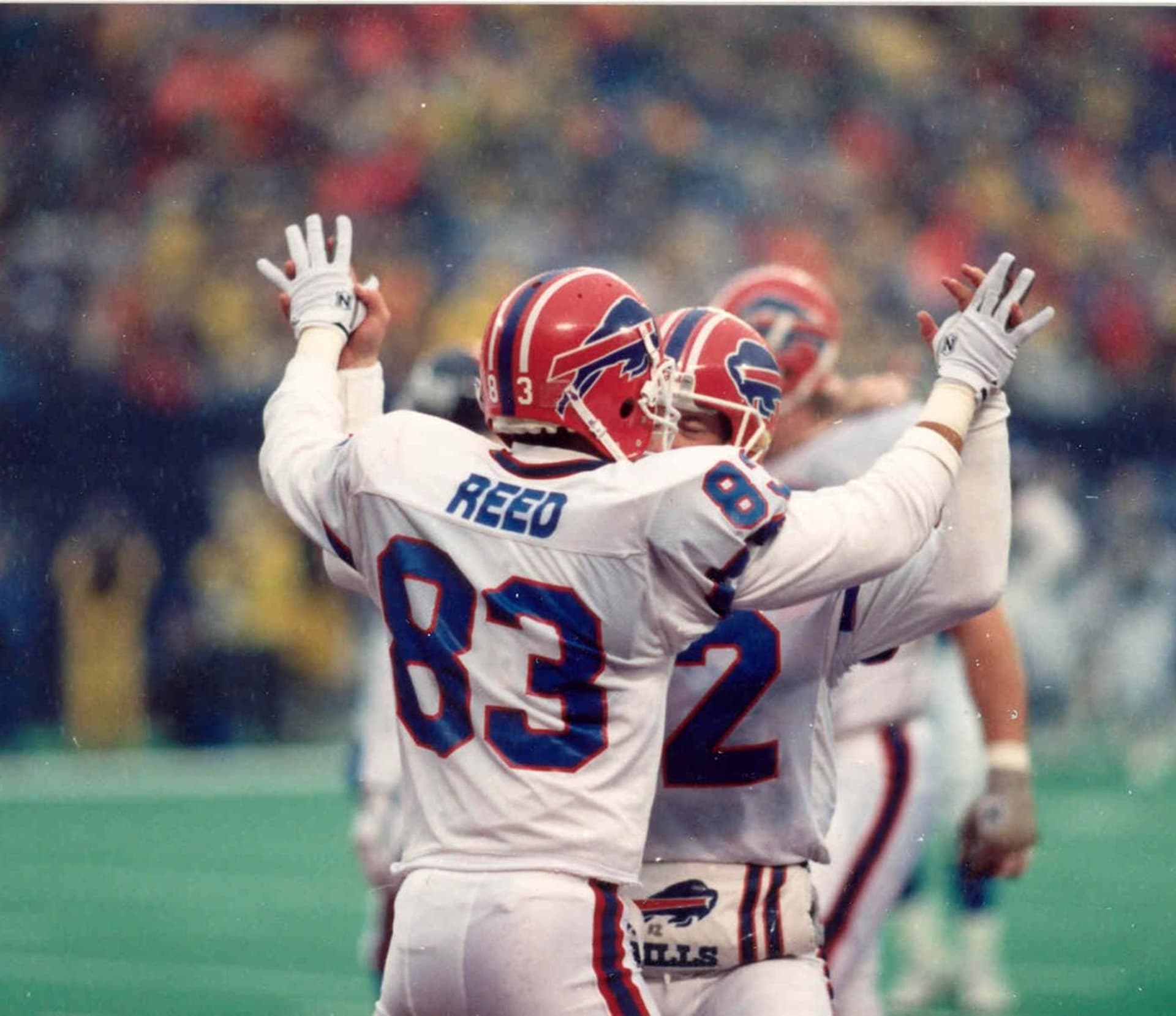 Andre Reed celebrates with teammate Don Beebe after a Bills playoff touchdown