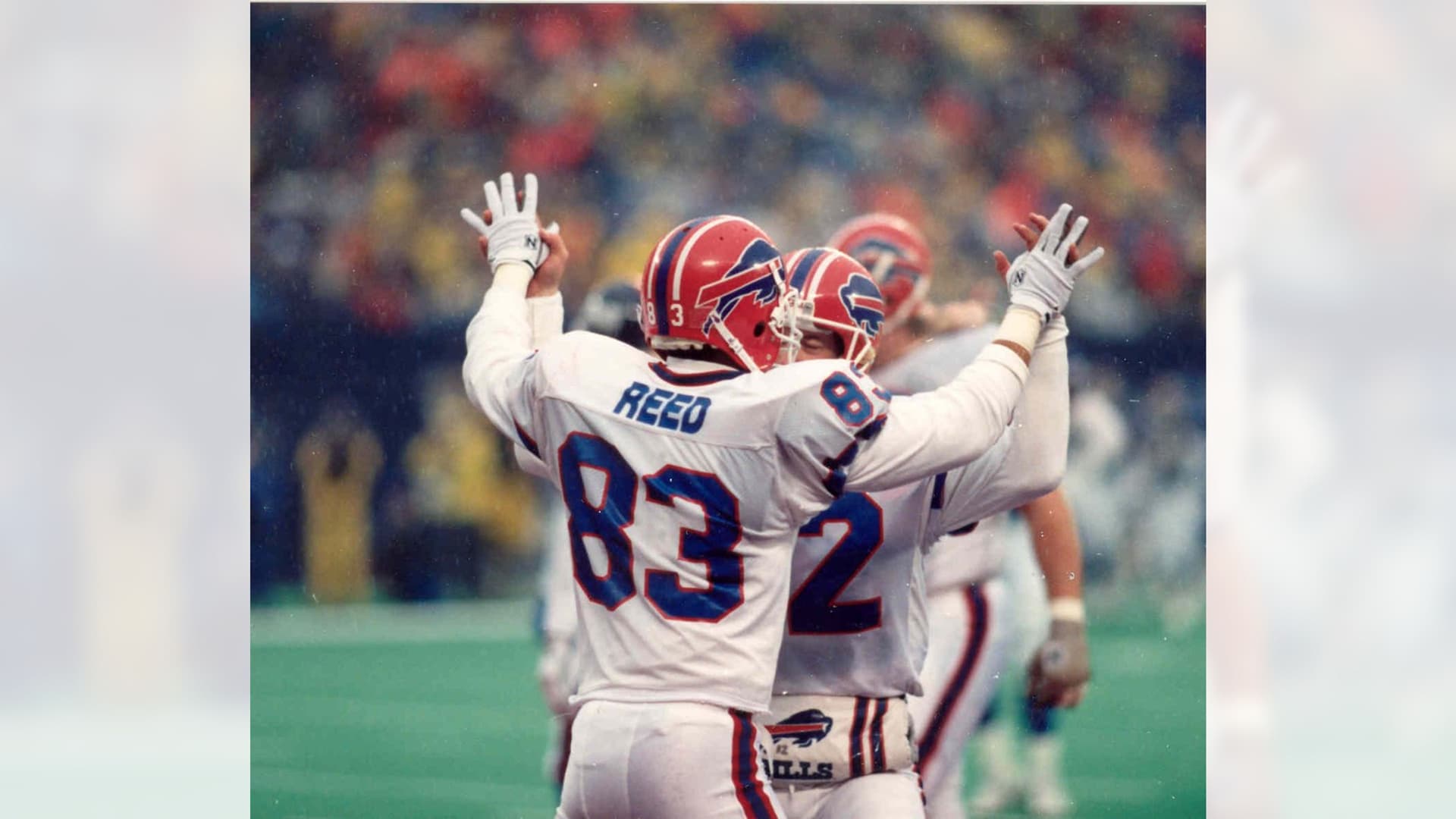 Andre Reed celebrates with teammate Don Beebe after a Bills playoff touchdown