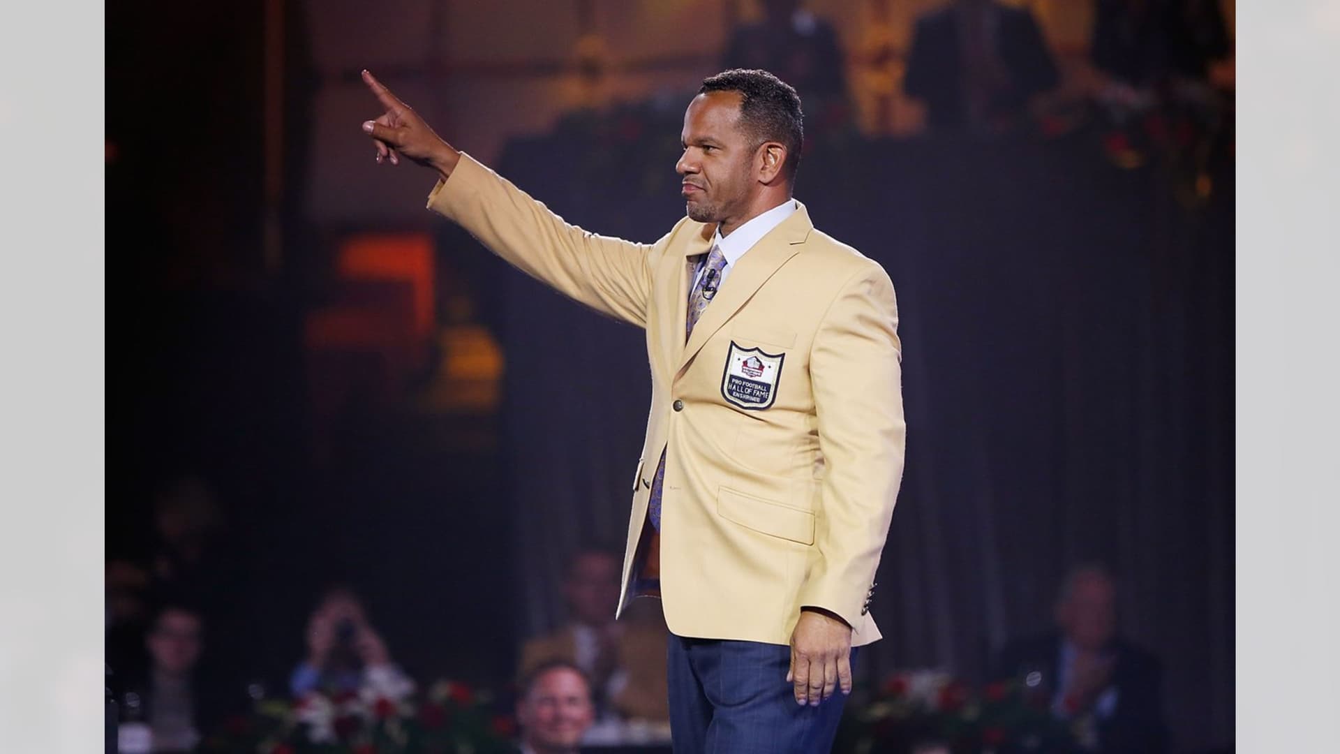 Andre Reed in his gold jacket at the 2014 Pro Football Hall of Fame ceremony in Canton, Ohio