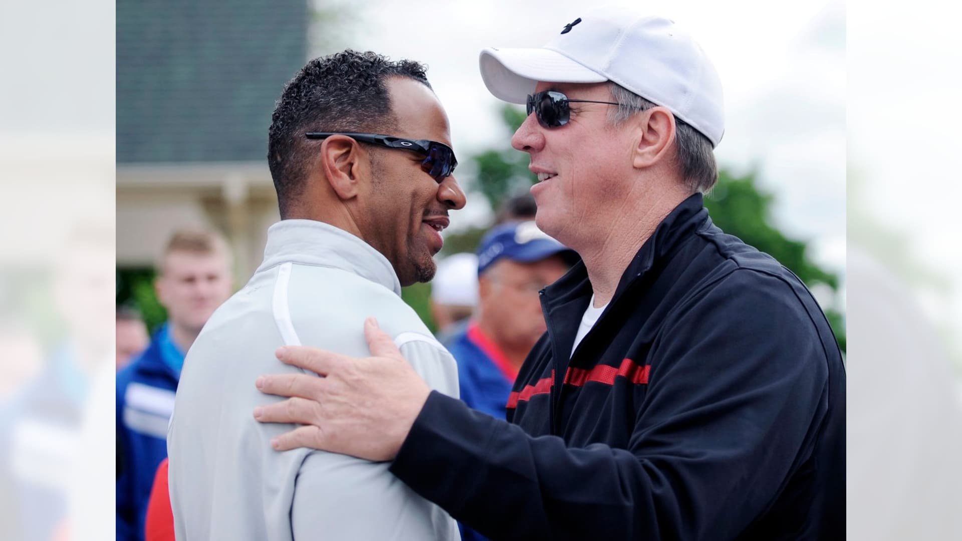 Andre Reed and Hall of Fame teammate Jim Kelly at a Buffalo Bills alumni event