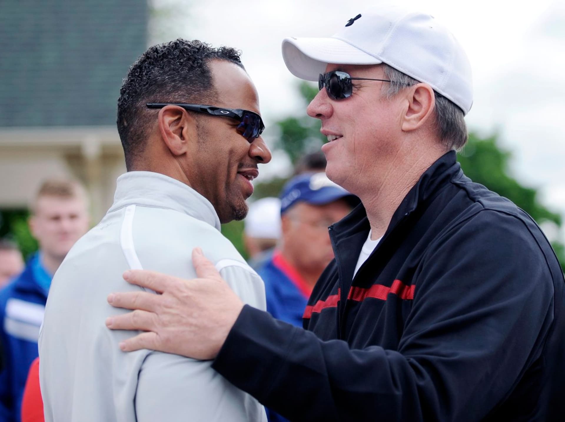 Andre Reed and Hall of Fame teammate Jim Kelly at a Buffalo Bills alumni event